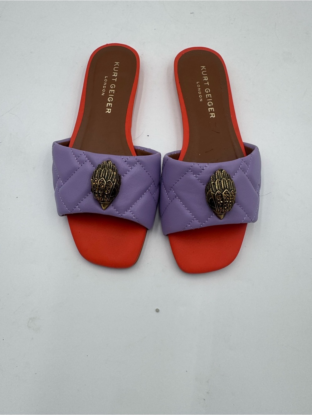 Kurt Geiger Lavender Quilted Slide Sandals with Red Footbed and Brass Emblem